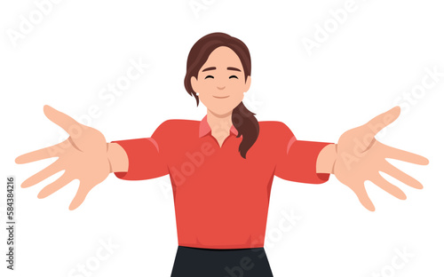 You are welcome! Cheerful woman gesturing welcome sign and smiling while standing against pink wall.