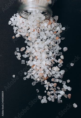 Himalayan salt on a black material  © Mariia