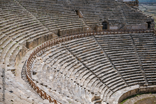 Ruins of theater in ancient Hierapolis now Pamukkale Turkey. Amphitheater (Coliseum) in ancient city Ephesus, Turkey in a beautiful summer day