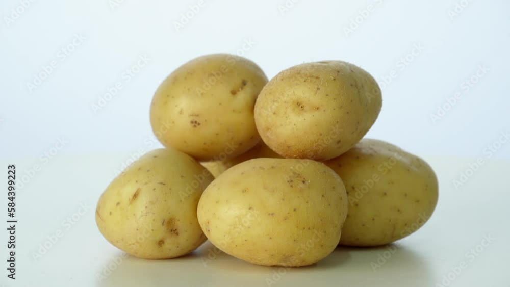 Potatoes Rotating On White Background
Potatoes Rotating On White Background