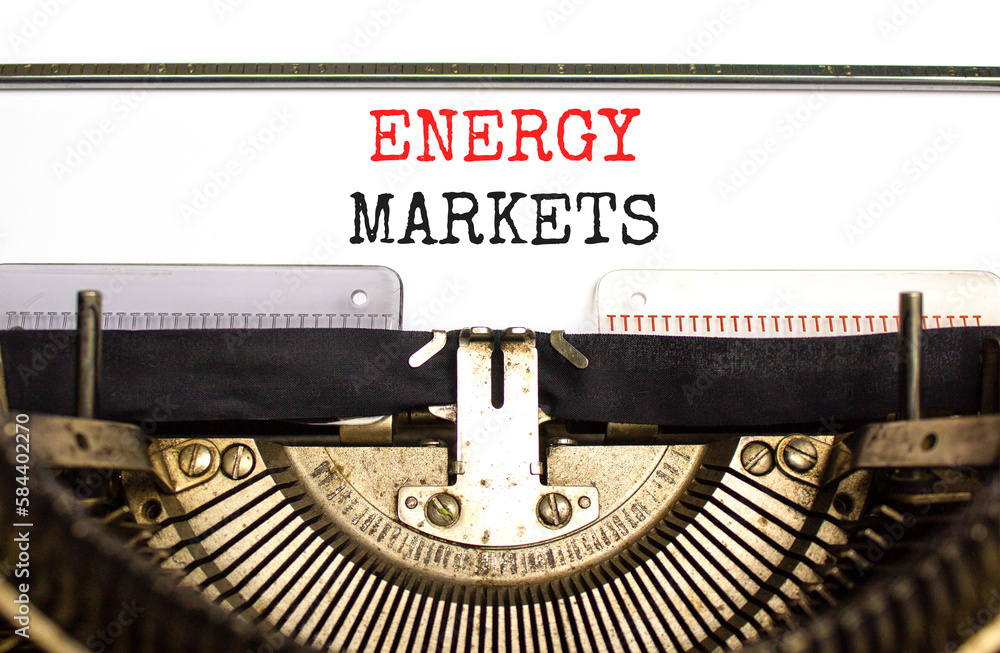 Energy markets symbol. Concept words Energy markets typed on white paper on old retro typewriter. Beautiful white background. Business energy markets concept. Copy space.