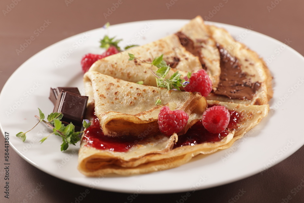 crepe with chocolate and raspberry jam crepe with chocolate and raspberry jam