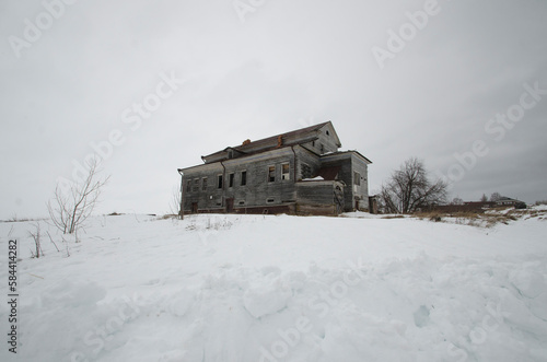 The abandoned mansion of the Bazhenin merchants in the village of Vavchuga. Russia, Arkhangelsk region, Kholmogorsky district