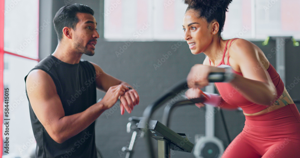 Fitness couch, gym athlete and training time of a woman workout and man with a sports watch. Exercise, motivation and health cardio together for wellness and healthy living in a coaching class Fitness couch, gym athlete and training time of a woman workout and man with a sports watch. Exercise, motivation and health cardio together for wellness and healthy living in a coaching class