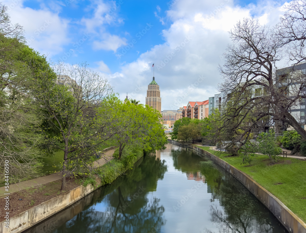 A view of the San Antonio skyline and the San Antonio river walking path. 
