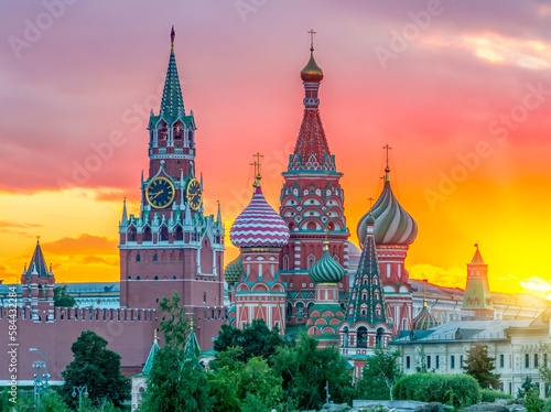 Cathedral of Vasily the Blessed (Saint Basil's Cathedral) and Spasskaya Tower of Moscow Kremlin on Red Square at sunset, Moscow, Russia