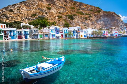 Scenic Klima village (traditional Greek village by the sea, the Cycladic-style) with sirmata - traditional fishermen's houses, Milos island, Cyclades, Greece.