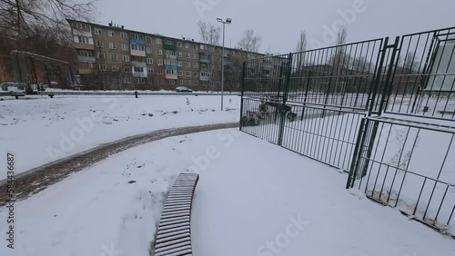 FPV shooting of snow removal equipment, snow removal machine operation, snow removal equipment, mtz tractor removes snow photo