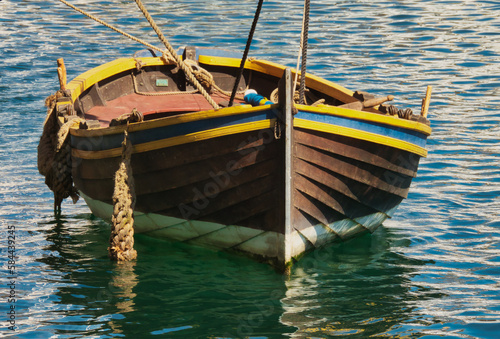 Wooden boat in the harbor on the mediterranean sea  Barcelona  Spain