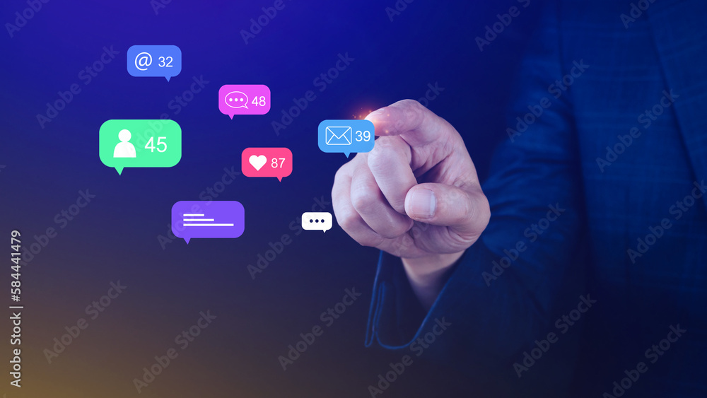 People using social media and digital online marketing concepts with icons such as notifications, messages, comments on the screen. People using social media and digital online marketing concepts with icons such as notifications, messages, comments on the screen.