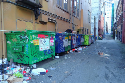 Garbage dumpsters in an alley