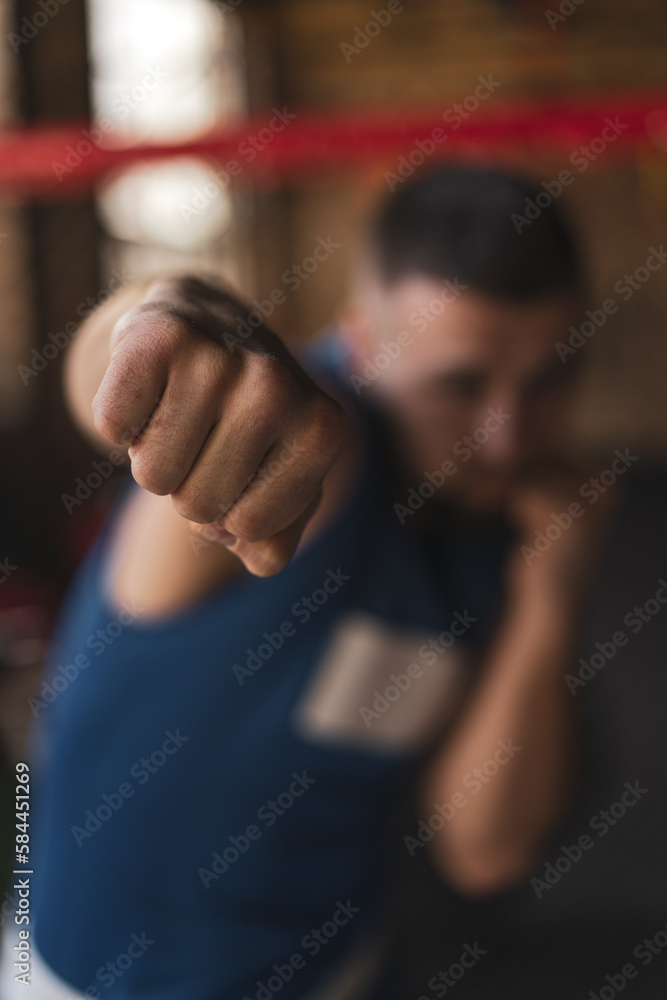 Close up of a boxer's fist in a gym punch