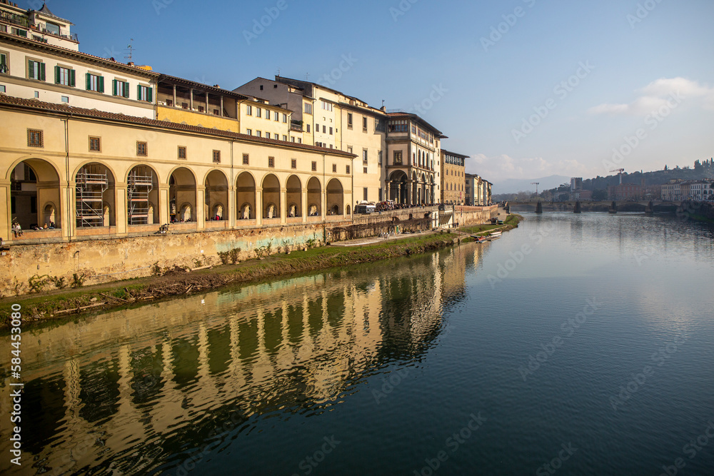 Bank of the Arno river in Florence with a view of the Uffizi museum, in Italy
