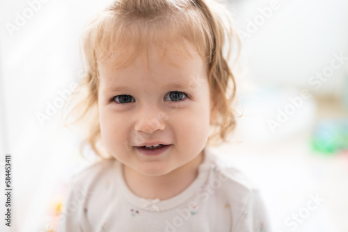 confident toddler girl smile, authentic joy, bright concept