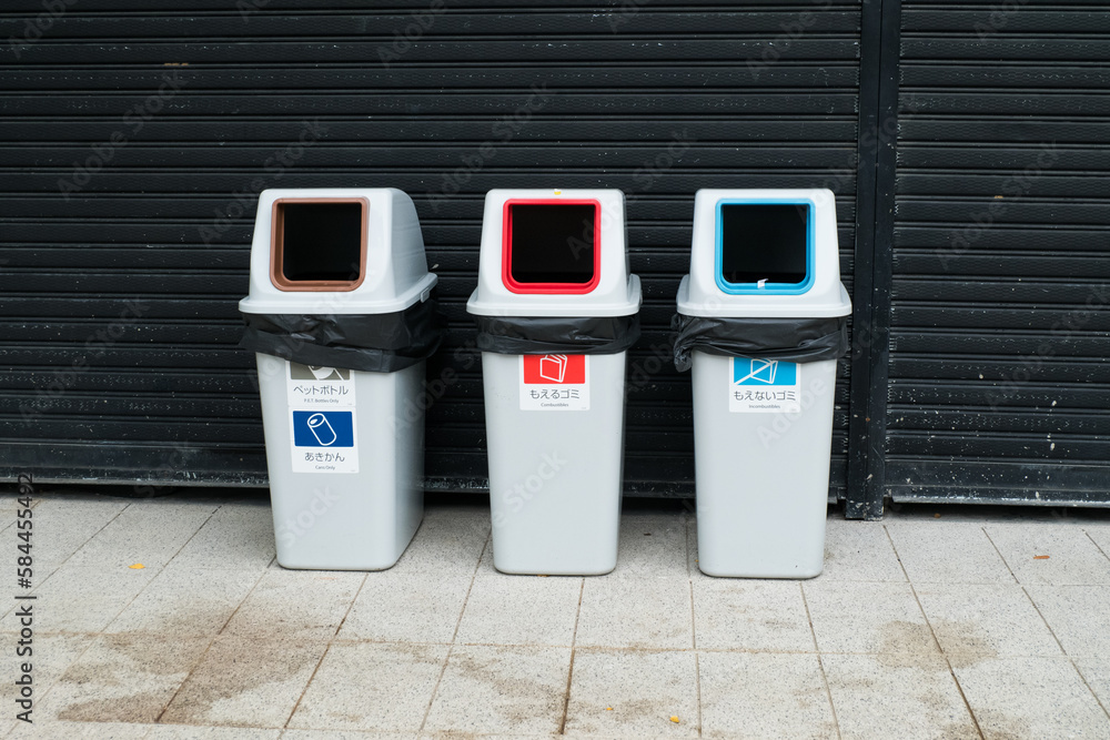 Recycling and Waste assorting trashcans on the street at a in Japan