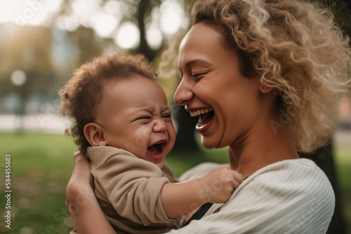 Portrait of enjoy happy love family african american mother playing with adorable little african american baby