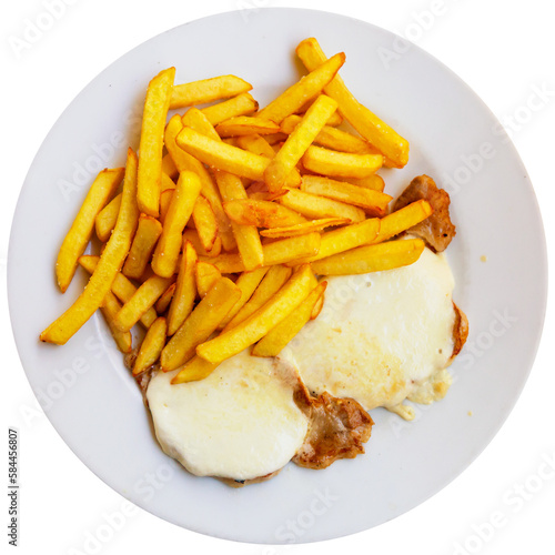 Tasty french style meat with side dish of fried potato closeup. Isolated over white background