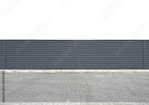 Urban steel corrugated fence placed on a transparent background along the road. Gray modern fence or hedge. Urban environment. Template or mockup