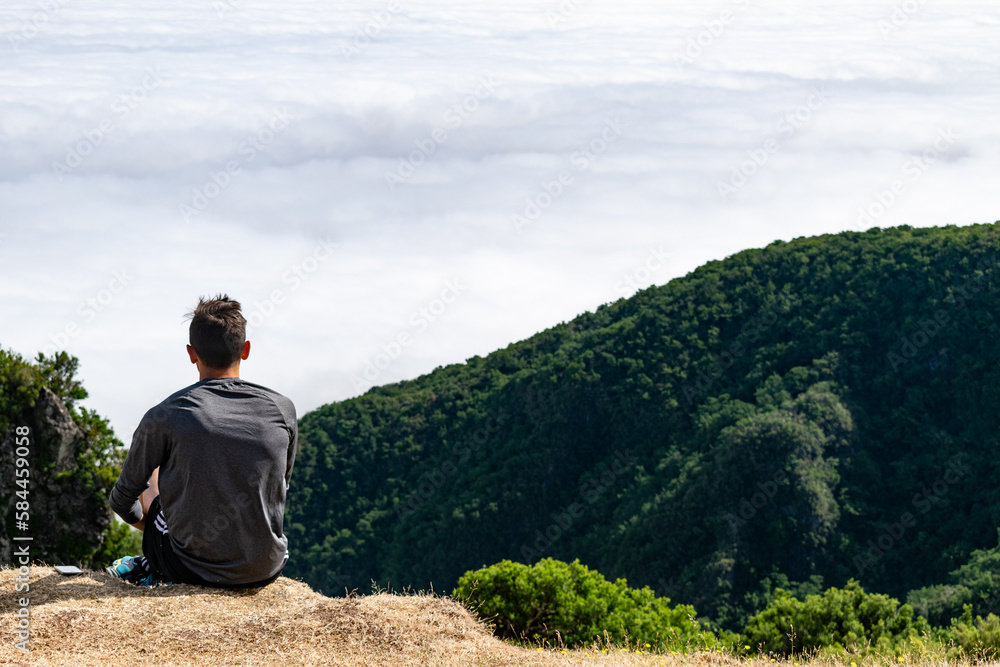 Madeira holiday summer trip vacation tourism mountains sunny day green trees landscape single man male sit relax Madeira holiday summer trip vacation tourism mountains sunny day green trees landscape single man male sit relax