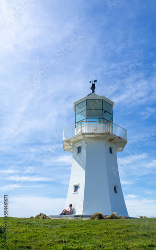 Pencarrow Upper Lighthouse. Wellington  New Zealand.  Looking up at the iconic Pencarrow Upper Lighthouse on a warm and bright summer s day.