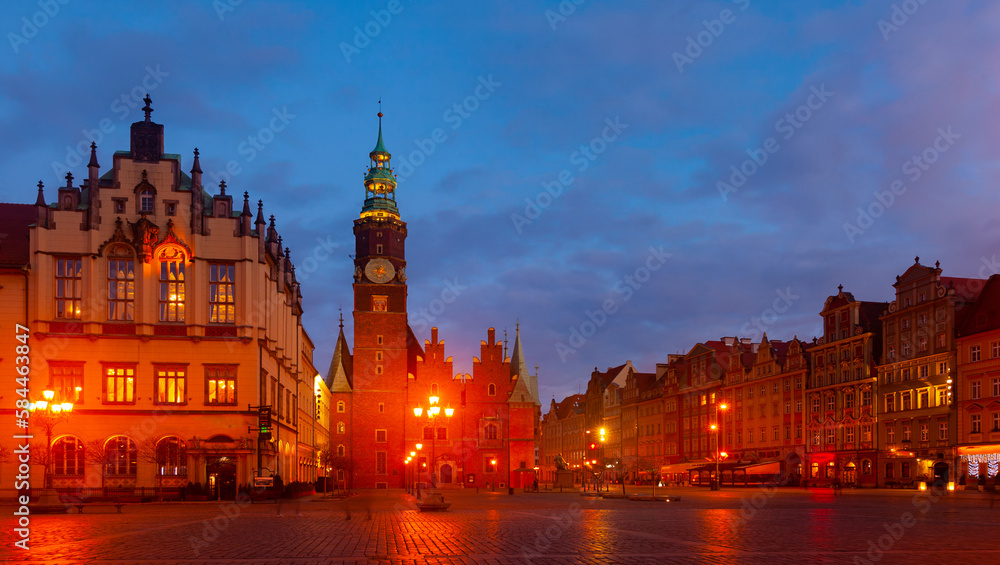 Fototapeta premium Gothic building of Old Town Hall in central square of Polish city of Wroclaw in night lights