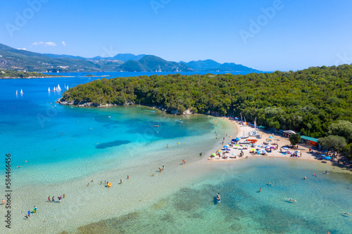 Fototapeta Naklejka Na Ścianę i Meble -  Aerial view of iconic paradise sandy beaches with turquoise sea in complex islands of Agios Nikolaos and Mourtos in Sivota area, Epirus, Greece