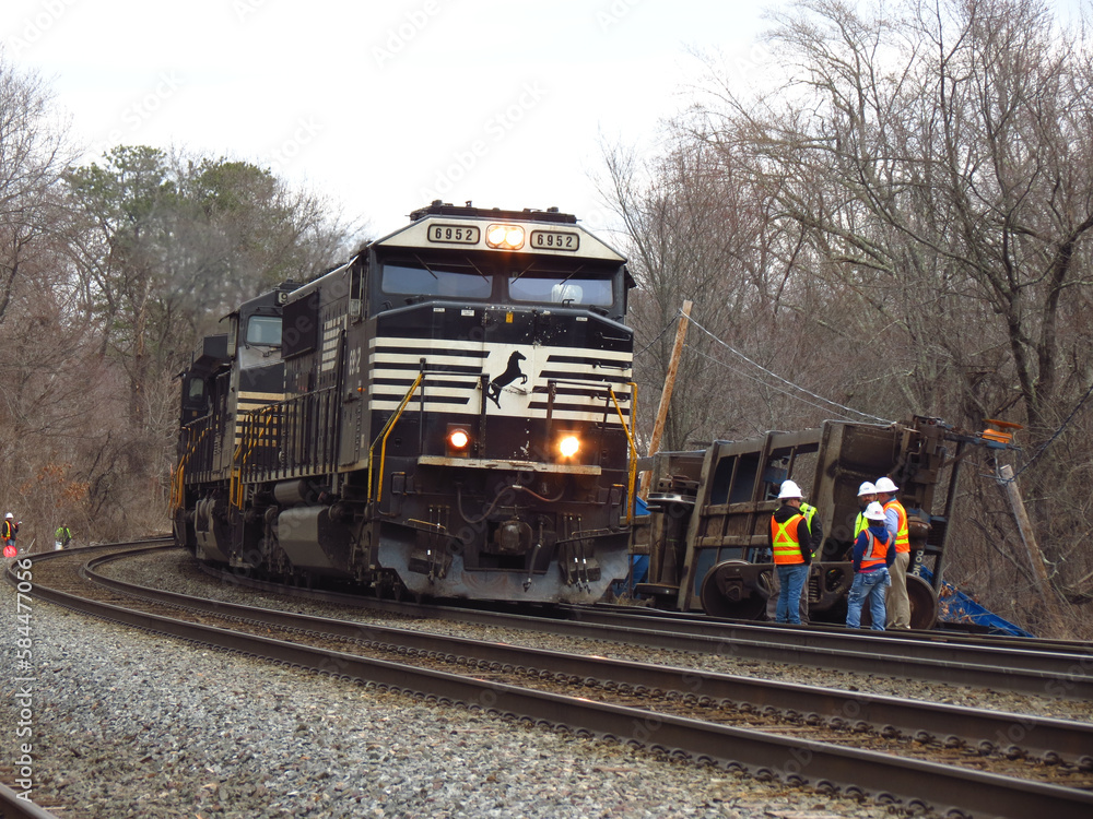Ayer, Massachusetts/USA - 3/23/2023 - Norfolk Southern locomotives work to put together the rest of train #265 after at least 5 well cars carrying trash and recyclables derailed this morning. Ayer, Massachusetts/USA - 3/23/2023 - Norfolk Southern locomotives work to put together the rest of train #265 after at least 5 well cars carrying trash and recyclables derailed this morning.