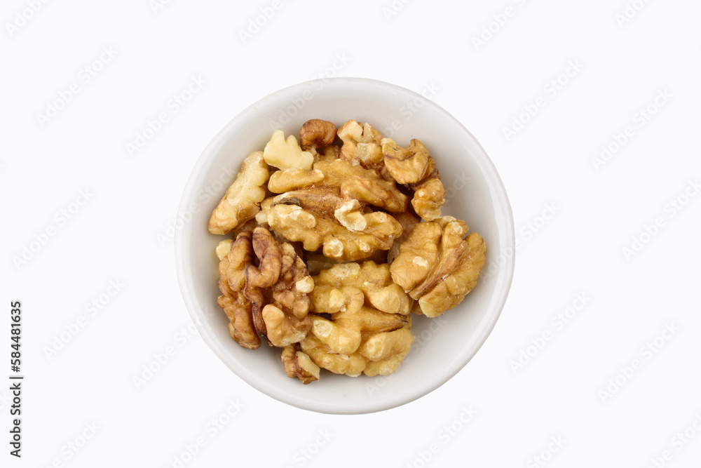 Top view of walnut in bowl isolated on white background with clipping path Top view of walnut in bowl isolated on white background with clipping path
