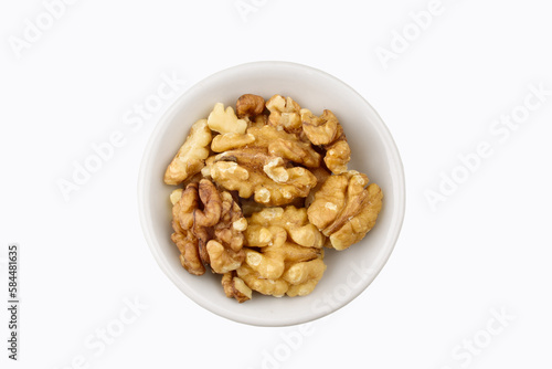 Top view of walnut in bowl isolated on white background with clipping path