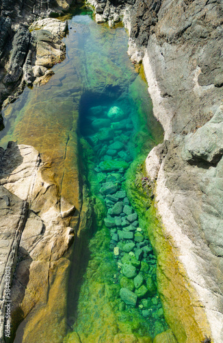Beautiful image of the natural rock pools of Aguas Verdes with stunning colours and rock formations near Betancuria in Fuerteventura The Canary Islands Spain