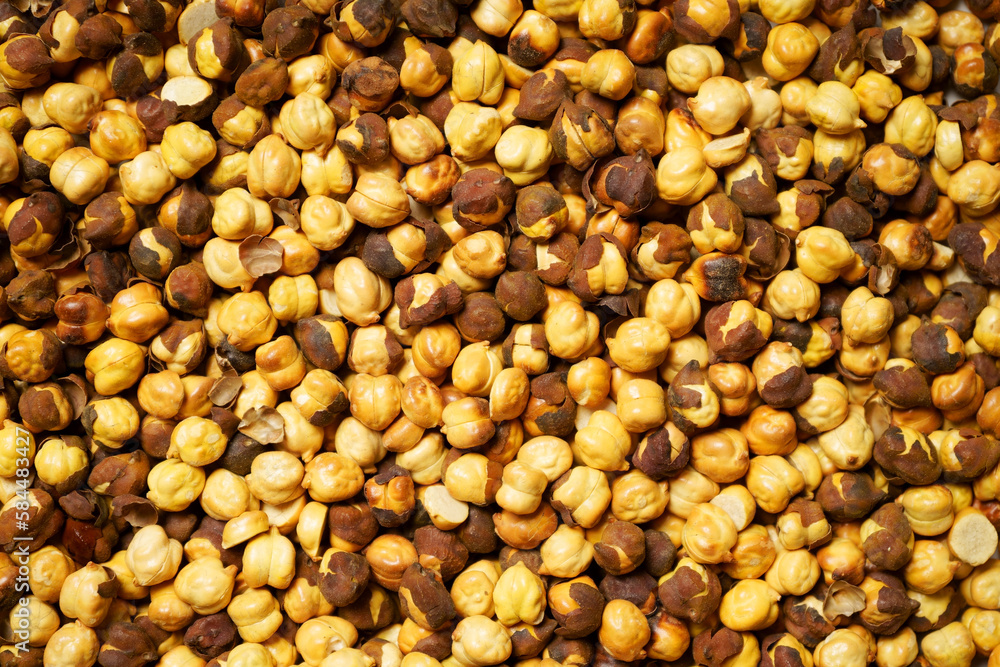 Roasted chickpeas texture background, bhuna chana