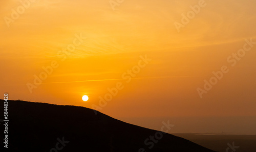 Beautiful and dramatic sunset colours over the volcanic mountain range near Corralejo in Fuerteventura Canary Islands Spain