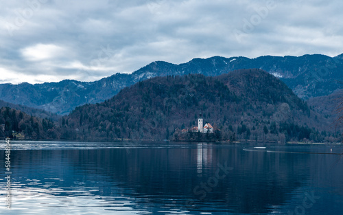 Castle and church on Slovenian lake Bled in winter