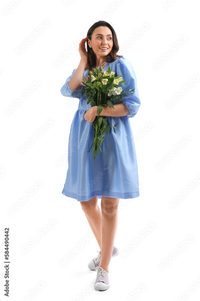 Young woman in blue dress with alstroemeria flowers on white background Young woman in blue dress with alstroemeria flowers on white background