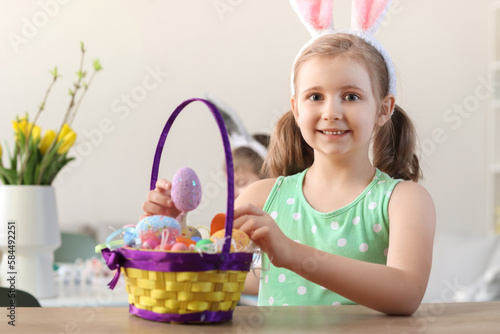 Little girl with bunny ears...