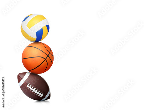 Stack of different sport balls on white background