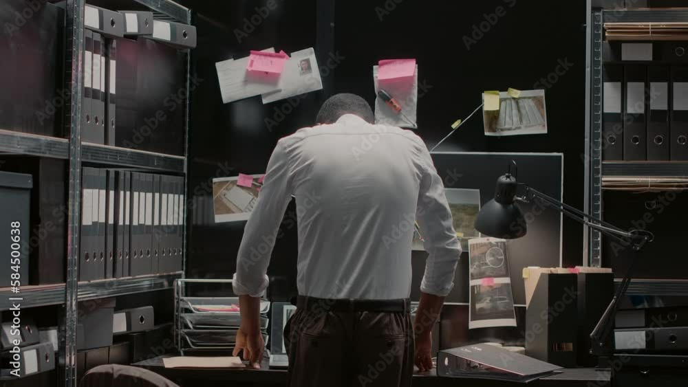 Detective analyzing criminal files and photos on board, searching insight to find suspect. Police investigator looking at forensic evidence and suspicious clues, reading statements. Detective analyzing criminal files and photos on board, searching insight to find suspect. Police investigator looking at forensic evidence and suspicious clues, reading statements.