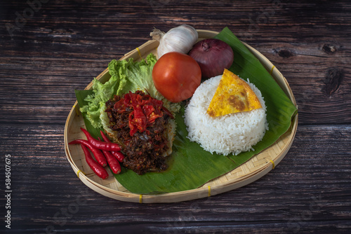 Popular Asian Food of Beef Dendeng (Daging Dendeng) served with plain rice photo