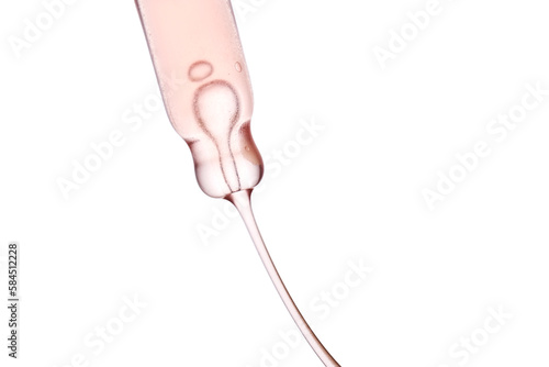 Pipette with a viscous pink cosmetic close-up.