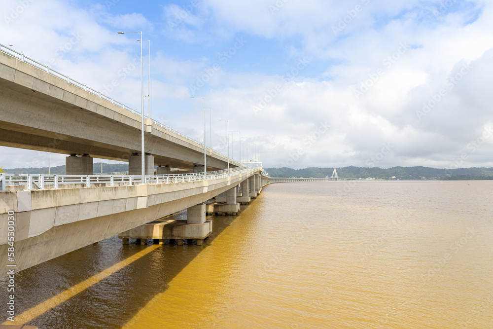 a dual-carriageway bridge across Brunei Bay