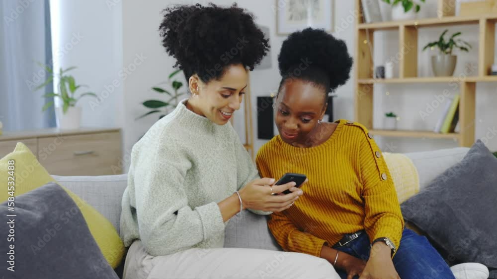 Phone, relax and friends on a sofa browsing social media, app or the internet in a living room, happy and bond. Smartphone, search and women talking on a couch while checking online on the weekend Phone, relax and friends on a sofa browsing social media, app or the internet in a living room, happy and bond. Smartphone, search and women talking on a couch while checking online on the weekend