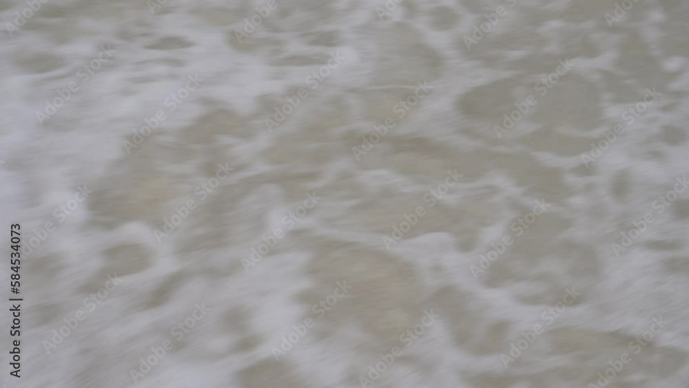 ocean wave on sand beach seashore seaside. Holiday vacation at sea ocean wave on sand beach seashore seaside. Holiday vacation at sea