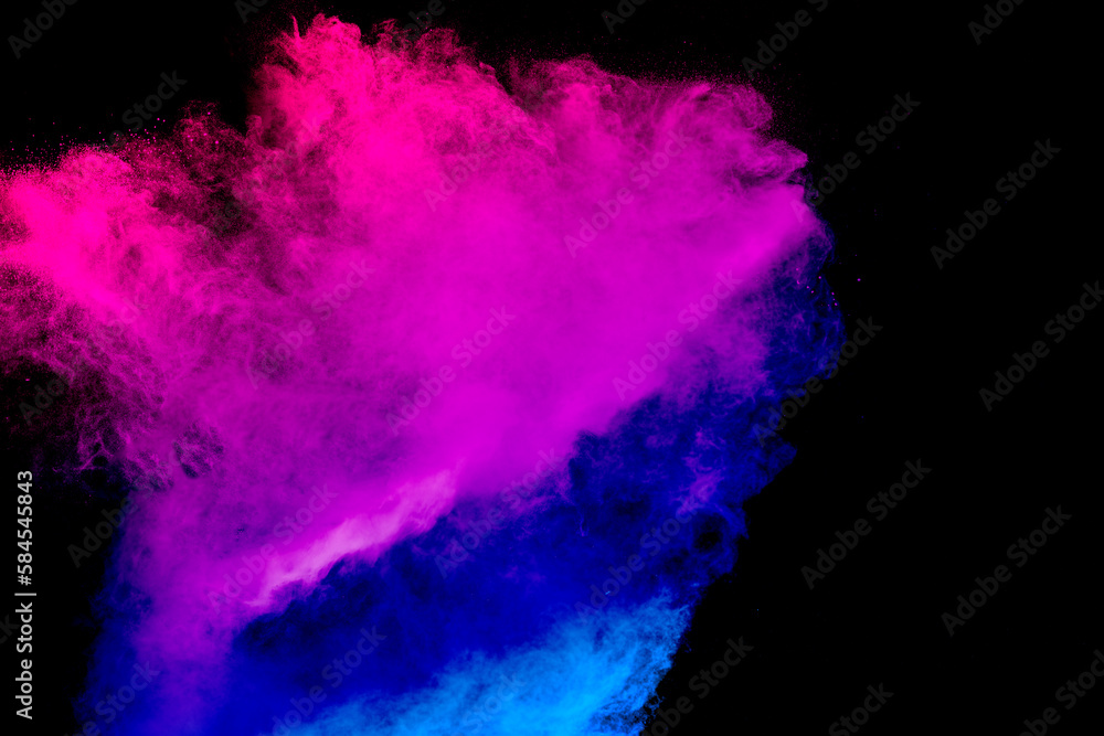 Launched blue pink dust particles splashing.Bizarre forms of blue pink powder explosion cloud on white background.