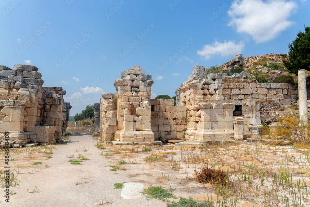 Perge, or Perga is ancient Anatolian city in Pamphylia. Ruined city gate. Antalya region, Turkey (Turkiye). Travel and ancient history concept