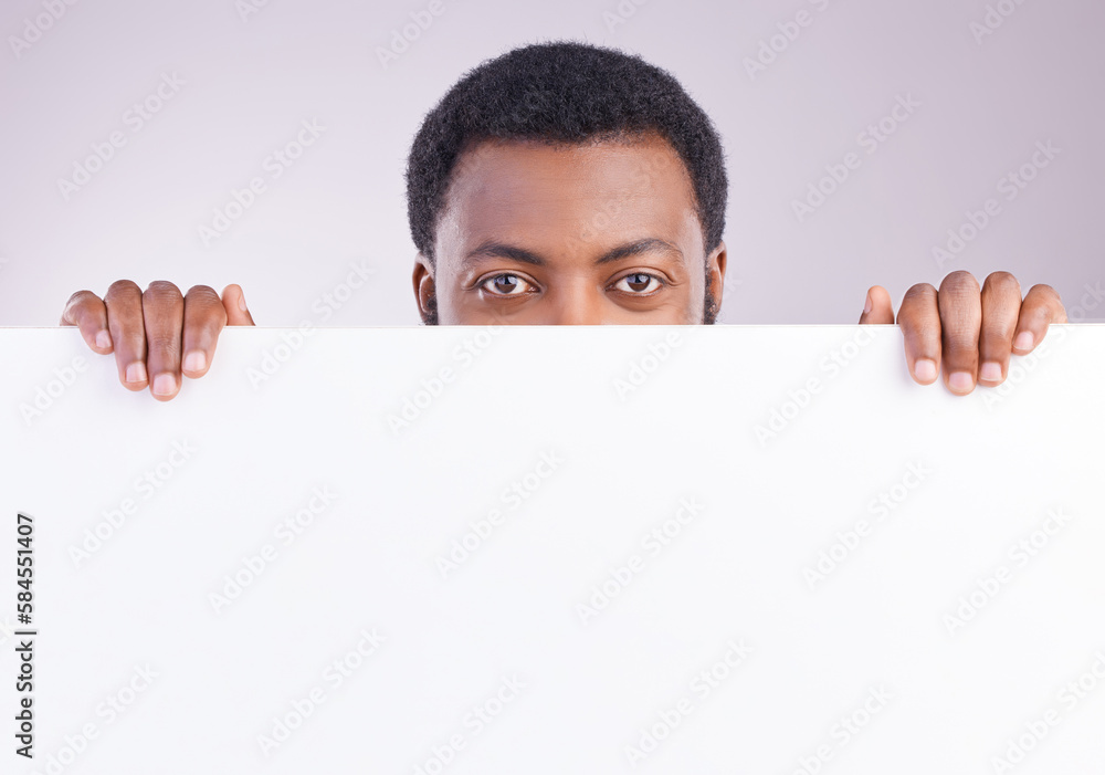 Mockup, space and portrait of a black man with a board isolated on a white background in a studio. Showing, branding and an African person peaking from a blank poster with mock up for advertisement Mockup, space and portrait of a black man with a board isolated on a white background in a studio. Showing, branding and an African person peaking from a blank poster with mock up for advertisement