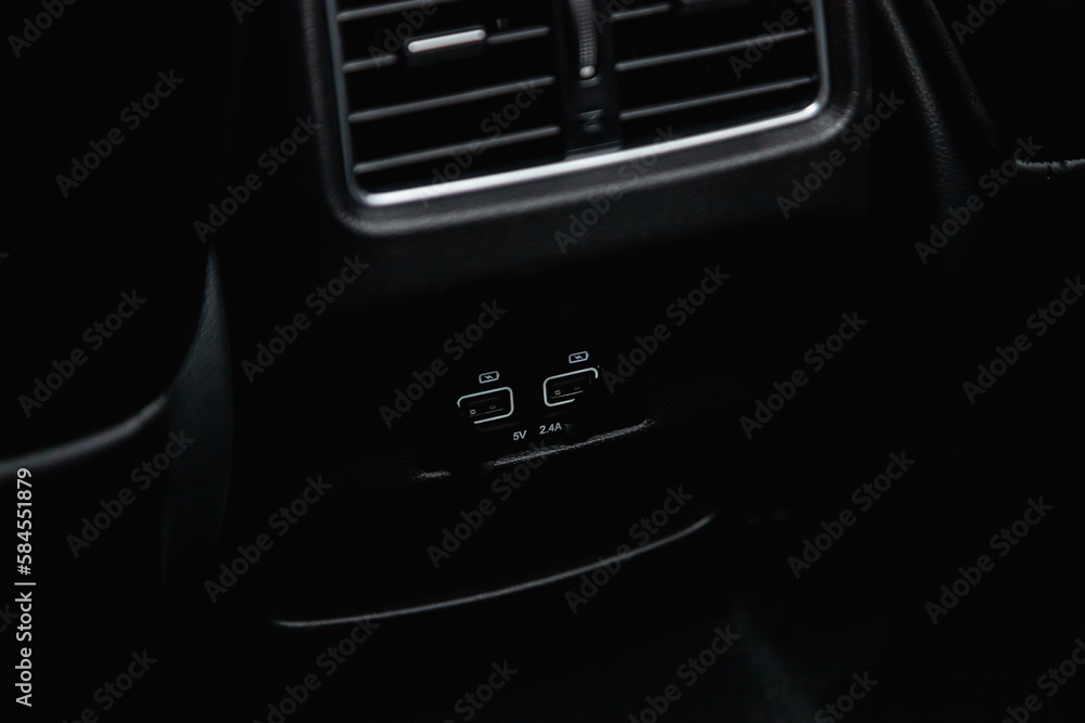 two USB port in the car panel, close up two USB port in the car panel, close up