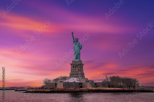 famous statue of liberty twilight sky at sunset light,