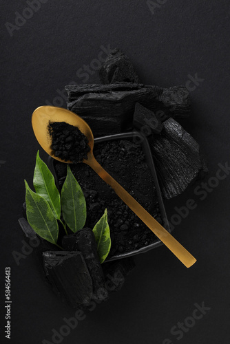 Natural wood or hardwood charcoal on black background