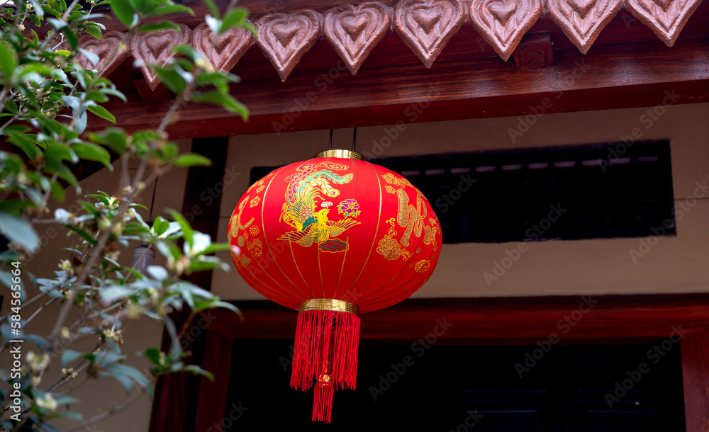 Red china lantern hanging on traditional roof during celebration new year. New year lunar 2023 symbol. Happy new year celebration 2023.