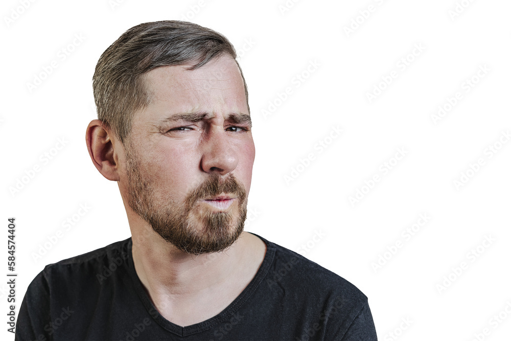 Portrait of an attractive bearded man of European appearance, with a slight gray hair, on an isolated white background. Wrinkles the nose. Expression of emotions of a man Portrait of an attractive bearded man of European appearance, with a slight gray hair, on an isolated white background. Wrinkles the nose. Expression of emotions of a man